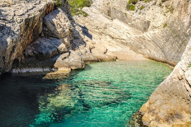 Blue cave group tour with swimming and snorkelling from Hvar - Stiniva Cove brings the best cliff scenery