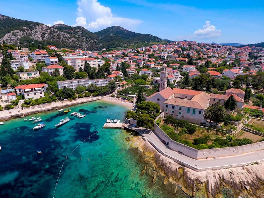 Blue Cave & Island Treasures: Komiža & 5 Gems Boat Tour - Stiniva Cove: cliffs, water, and limited beach time