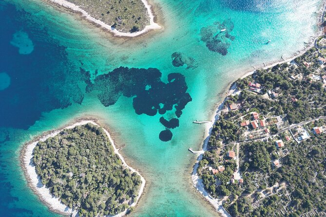 Blue Lagoon Tour from Split with Bottled Water and Wine Included - Krknjasi Bay brings the blue-water break