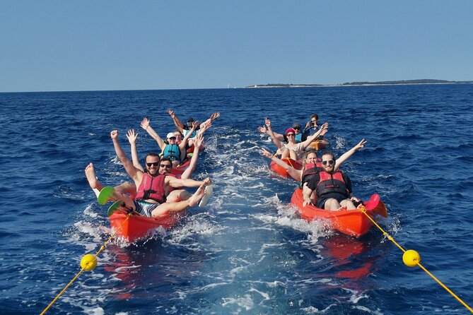 BOAT & KAYAK! Sea Adventure - Snorkeling & Cliff Jumps - Paddling past Pula’s high cliffs