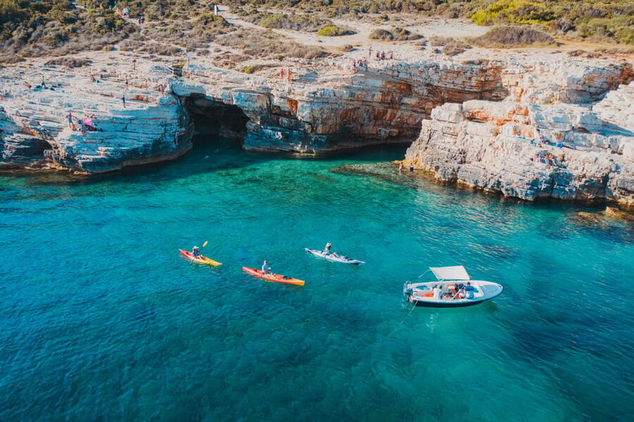 Cape Kamenjak: Cave and Safari Experience by Kayak - Snorkeling under the 15-meter cliff