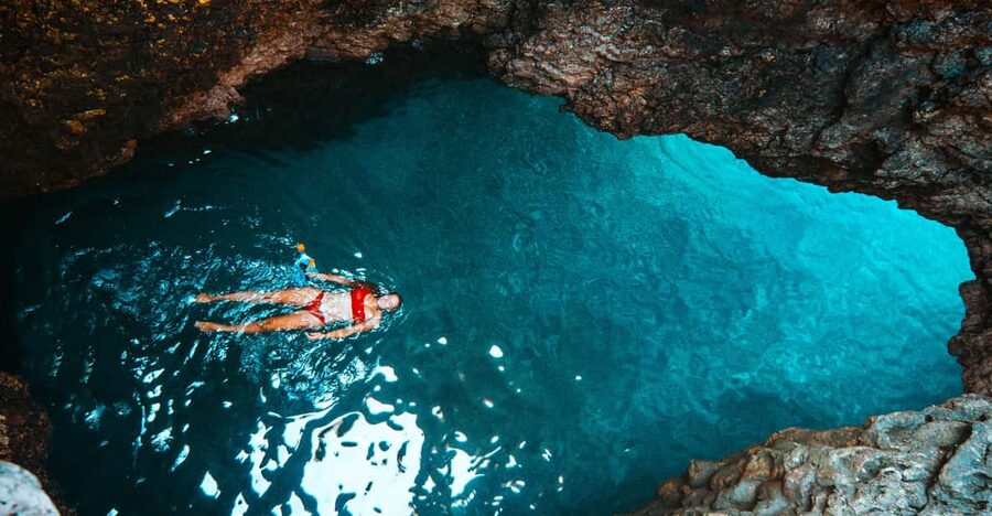 Cape Kamenjak: Kayak Tour with Cave Experience - Snorkeling with fish in clear water