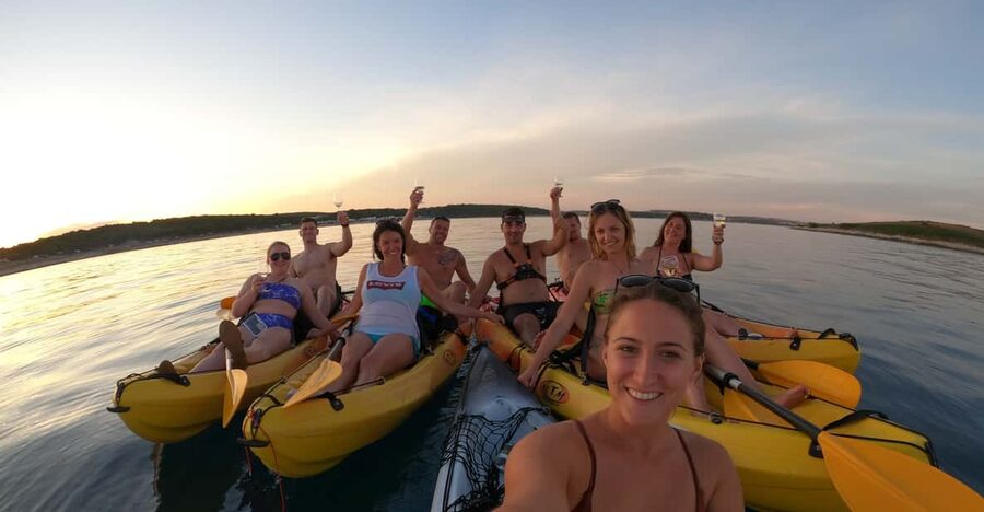 Cape Kamenjak: Sunset Kayak/SUP Wine Tour - Paddling past Trumbuja toward Ceja
