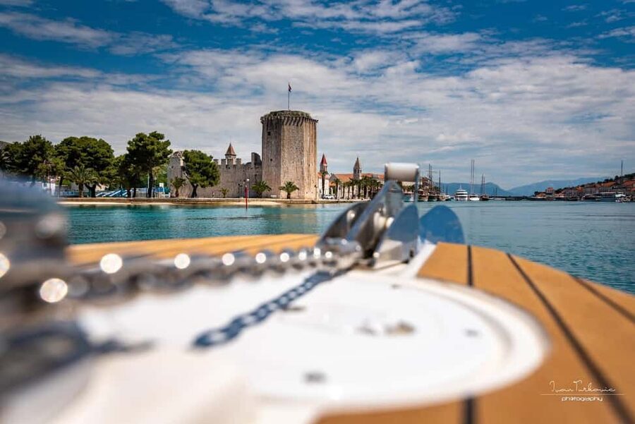 Discover Trogir: Guided Walking Tour of a Medieval Gem - Entering through Trogir’s ancient town gate