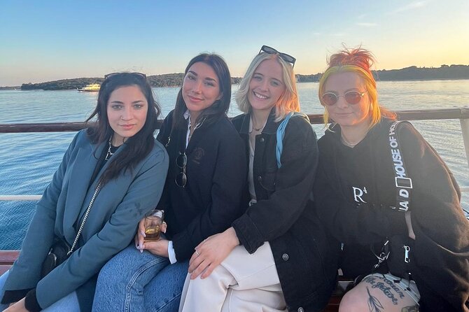 Dolphin Watching & Sunset Boat Tour With Dinner and Drinks - Dinner, Wine, and the Return at Sunset