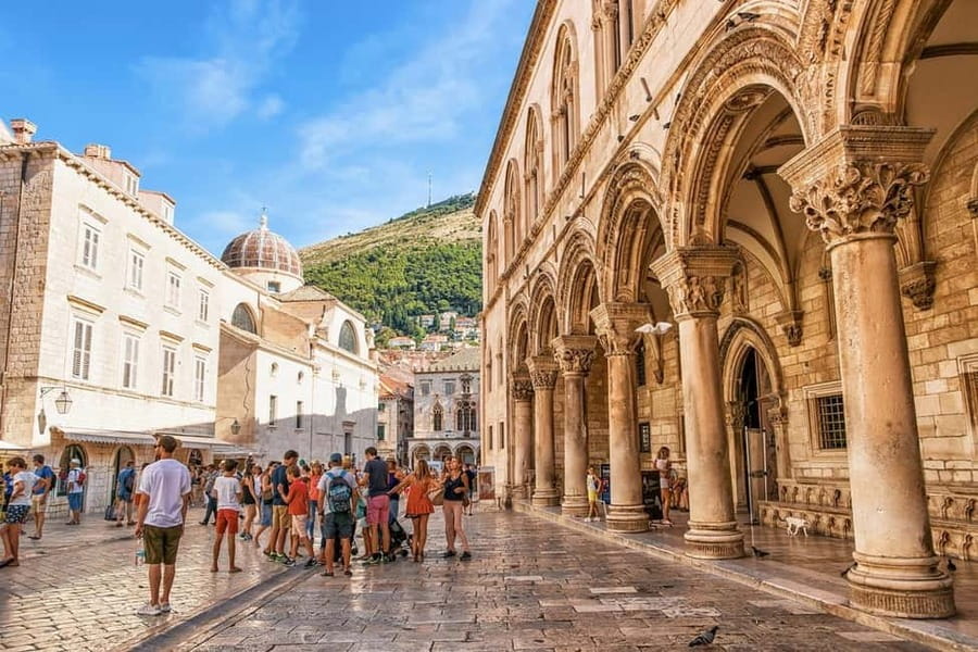 Dubrovnik: City Walls, Old Town Walking Tour & Adriatic View - Franciscan history, a working pharmacy, and St. Saviour Church