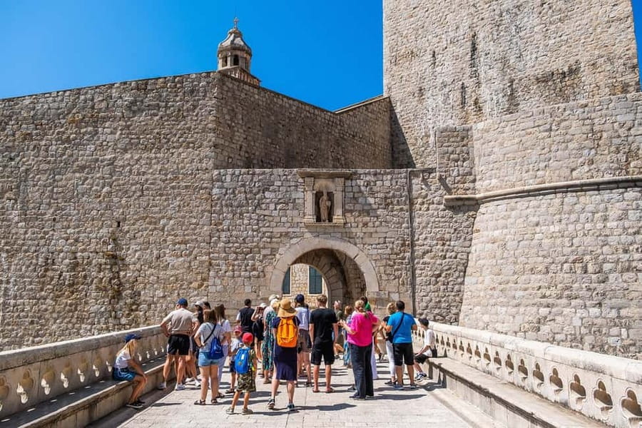 Dubrovnik: City Walls, Old Town Walking Tour & Adriatic View - Stradun turns a street into a city lesson