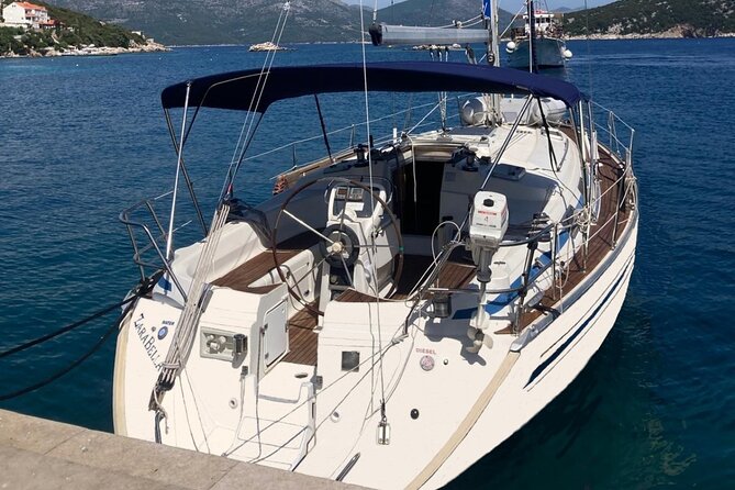 Dubrovnik: Full Day Private Sail Boat tour to Elaphiti&Blue Cave - Šunj Beach: sand, rocks, and a cold drink