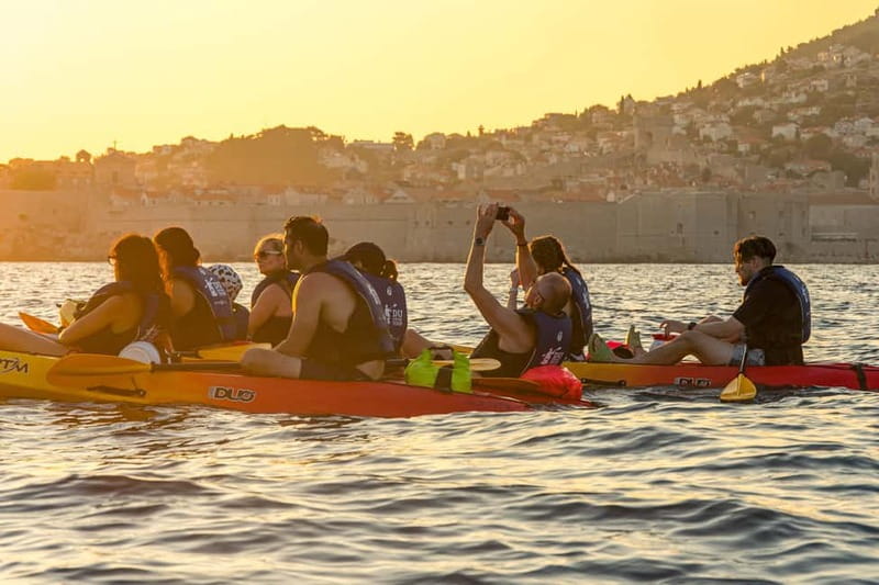 Dubrovnik: Guided Sunset Sea Kayaking with Snacks and Wine - Wine, snacks, and the sunset return