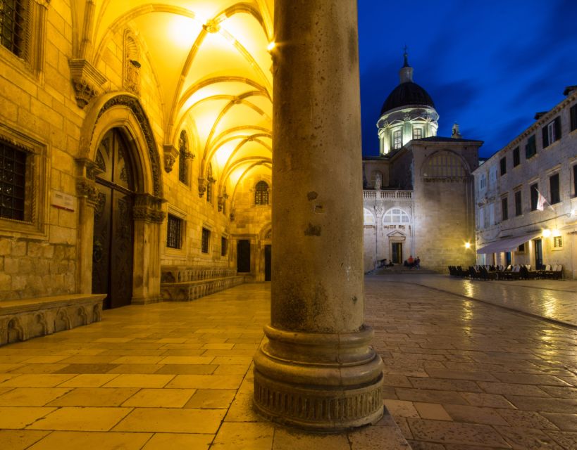 Dubrovnik: Old Town Highlights Guided Evening Walking Tour - Walking Stradun as the city winds down