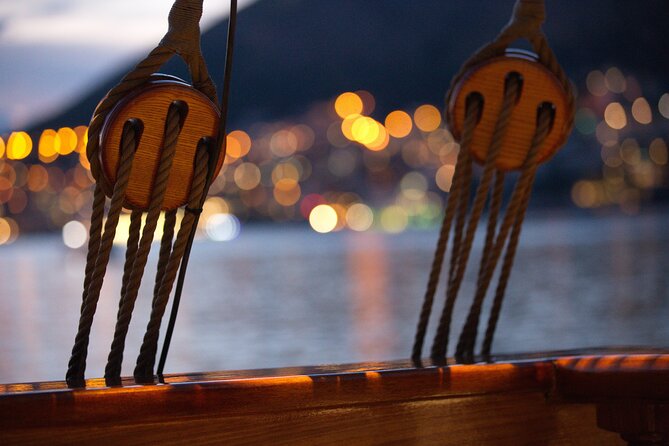 Dubrovnik Panoramic Night Cruise with Karaka - Returning through the harbor lights