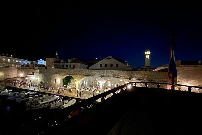 Dubrovnik Panoramic Night Cruise with Karaka - Passing Lovrjenac Fortress after dark