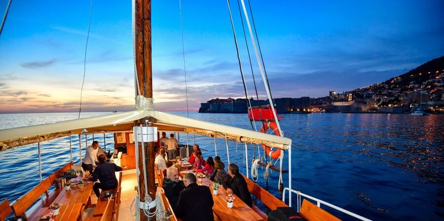 Dubrovnik: Sunset Dinner Cruise around the Old Town - Local snacks, seafood, and Popara on board