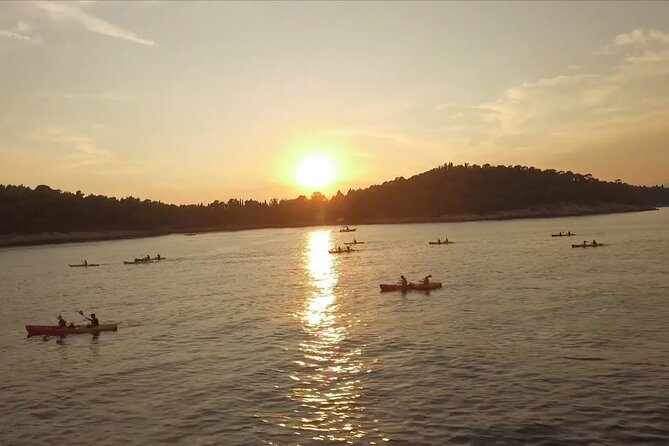 Dubrovnik: Sunset Kayaking & Snorkeling with water &wine - Paddling out from Pile Bay