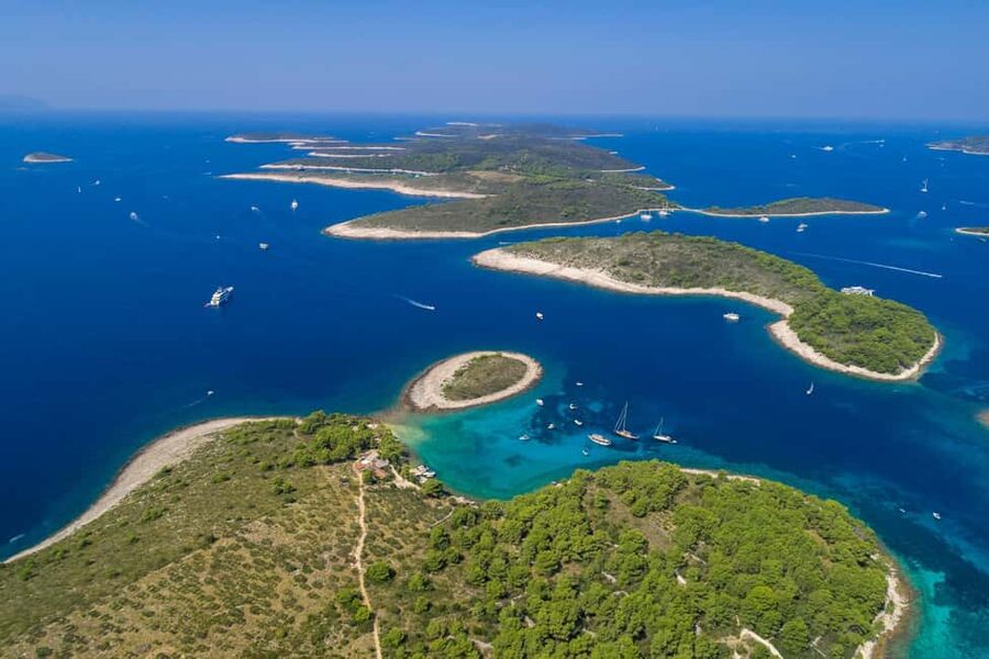 From Hvar: Blue Cave and Pakleni Islands Group Tour - Palmizana is the relaxed final stop