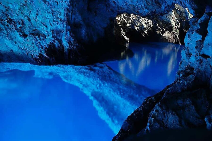 From Hvar: Blue cave group speedboat tour full day - The Green Cave offers a more active choice