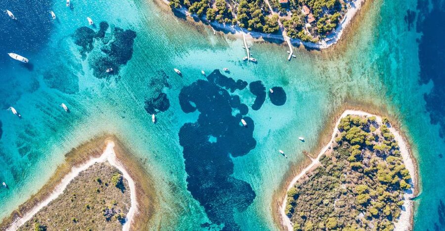 From Split: Blue Lagoon & Trogir Boat Trip with Snorkeling - Trogir, where the streets are the attraction