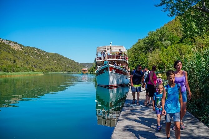 From Split: Krka Waterfalls Trip with Boat Cruise and Swimming - Primošten: swimming, lunch, and a slower finish