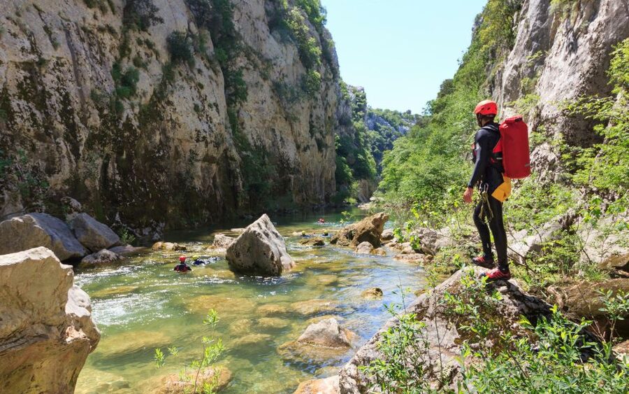 From Split or Zadvarje: Cetina River Canyoning - Swimming, sliding, and moving through the rapids