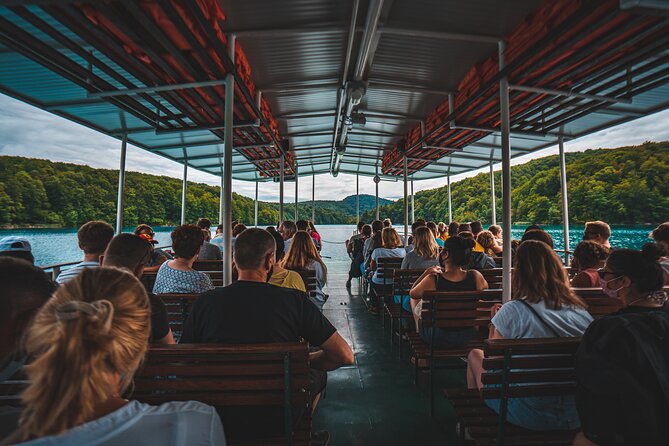 From Split: Self-Guided Plitvice Lakes Day Tour with Boat Ride - Boat ride, electric train, and changing views