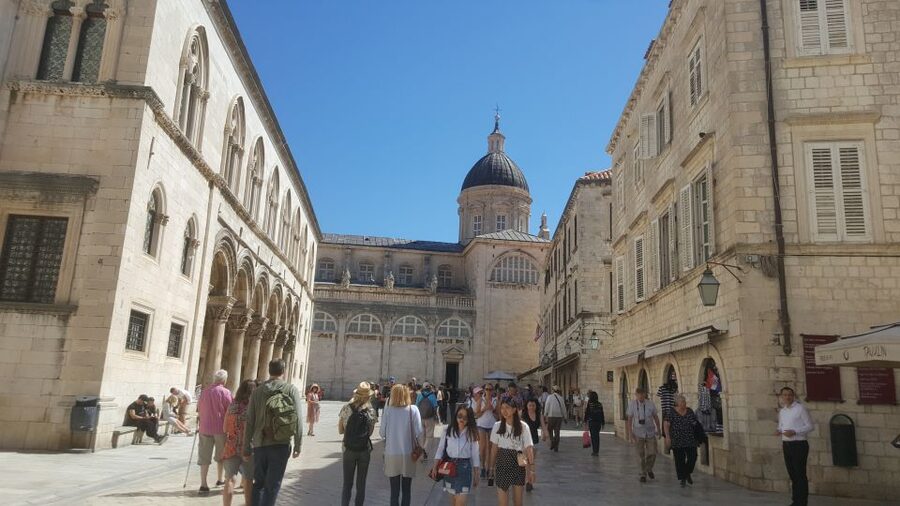 From Split/Trogir: Dubrovnik Guided Tour with a Stop in Ston - Entering Dubrovnik through the Stradun