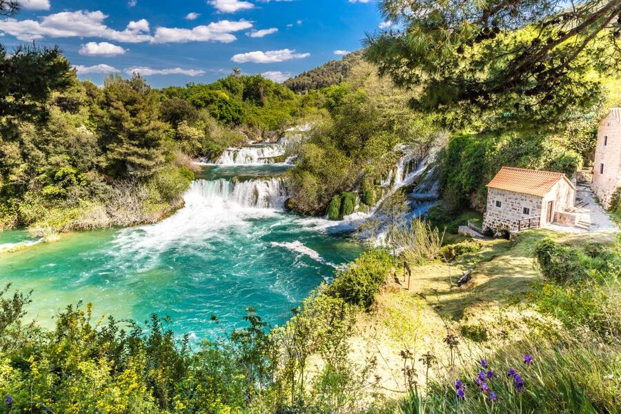 From Split & Trogir: Krka Waterfalls Day Tour with Boat Ride - The riverboat to Skradin