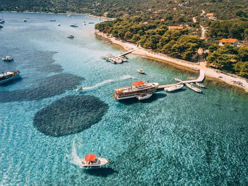From Trogir: Blue Lagoon & Šolta Cruise with Lunch & Drinks - Lunch beneath the pine trees