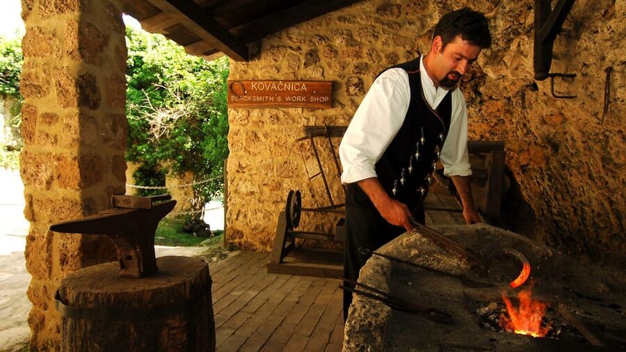 From Trogir, Seget & Okrug: Krka Waterfalls Gastro Tour - Walking the wooden paths at Krka