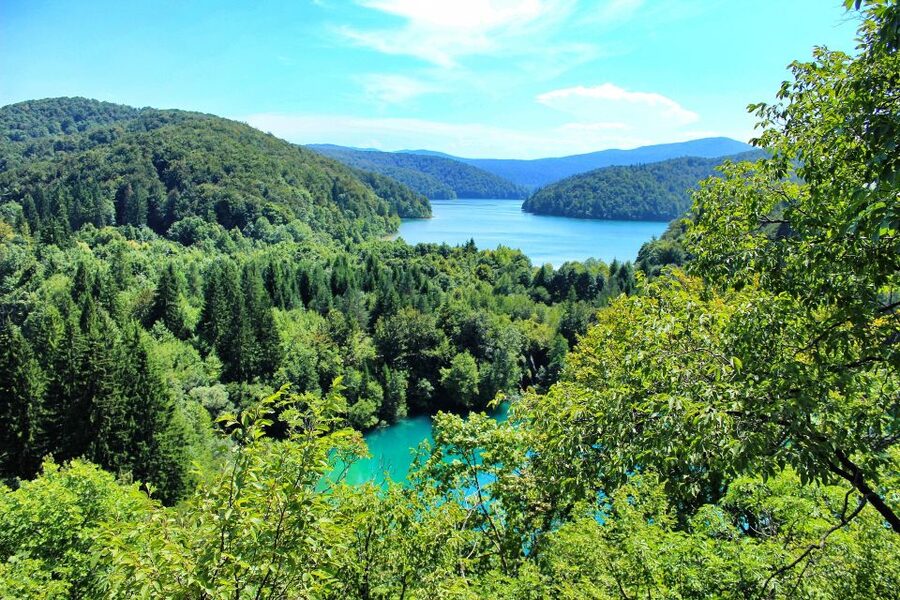 From Zagreb: Plitvice Lakes & Rastoke Private Tour - The Lake Kozjak boat ride breaks up the walking