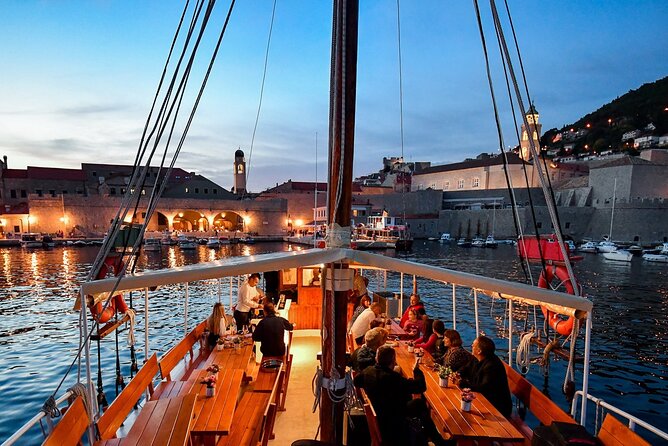 Gastro Cruise | Dinner and Boat ride around Dubrovnik Old Town - Passing the City Walls as the sun goes down