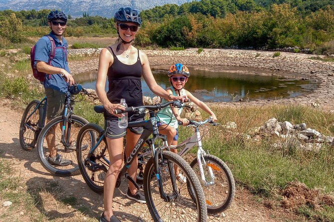 Half-Day Bike Tour in Lumbarda with Wine Tasting - Leaving Korčula Old Town on two wheels