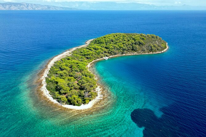 Half-day Speedboat Tour: Explore Hidden Gems of Hvar Island - Swimming beneath the cliffs at Mala Stiniva