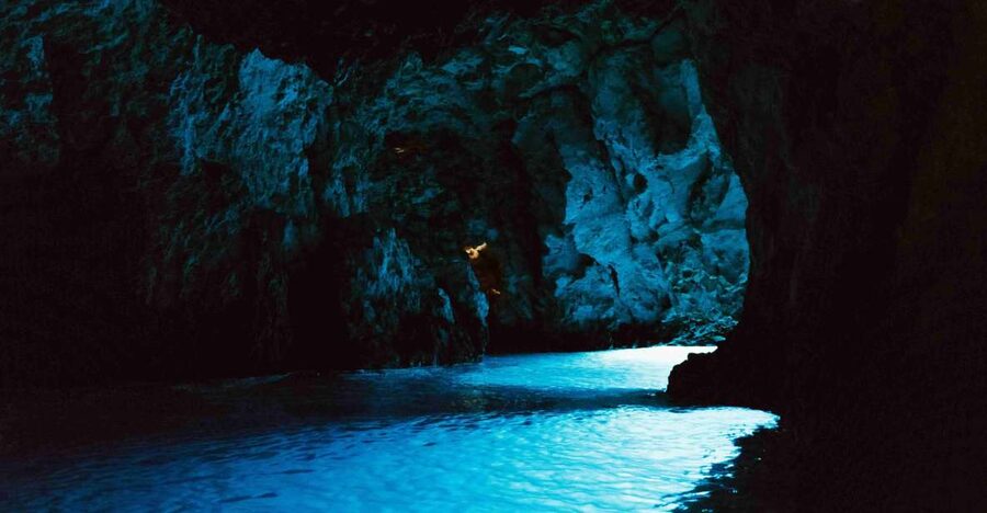 Hvar: Blue and Green Caves Boat Tour with Stiniva Beach - The Blue Cave’s brief blue glow
