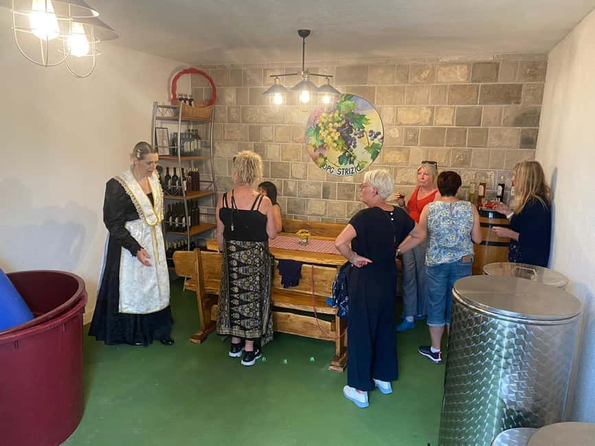 Kastela: Wine & Olive Tasting Tour w/Delicacies & Live Music - Accordion music and traditional dress