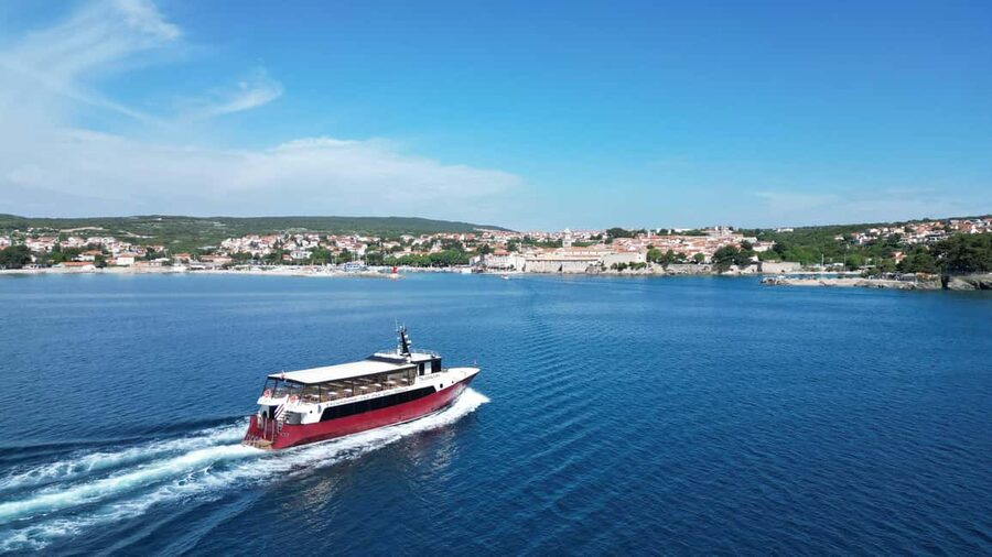 Krk:Rab & Pag Boat Trip with Swimming & City Tour with lunch - Krk to Rab, with the coastline as your opening view