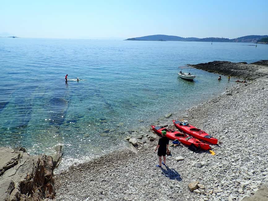 Lumbarda - Sunset Kayak Tour with a Picnic - Wine and Sweets - Paddling out from Tatinja Bay
