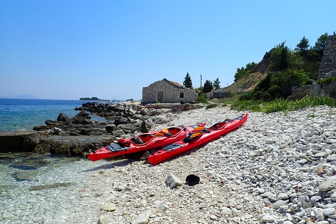 Lumbarda-Sunset Kayaking Experience with picnic: Wine and Sweets - What the guide adds to the outing