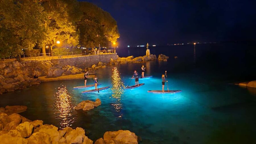 Opatija: Guided SUP Paddleboarding Adventure at Night - Setting out into the illuminated bay