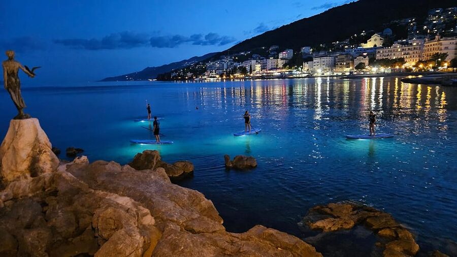 Opatija: Guided SUP Paddleboarding Adventure at Night - Opatija after sunset, with room to look around