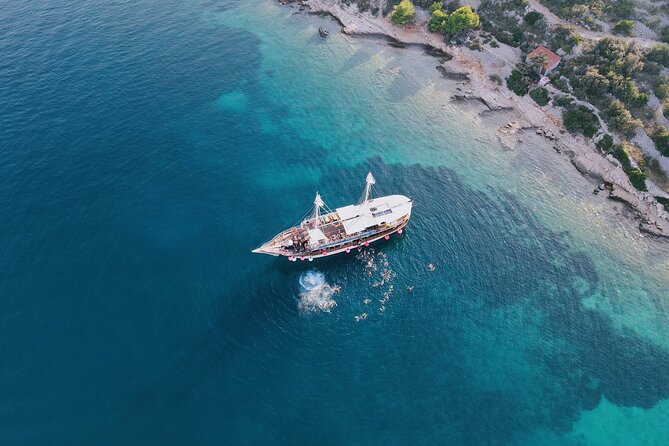Out to Sea Split Boat Party w/ Blue Lagoon Swim, Dj & Afterparty - Welcome shots, bars, and food on board
