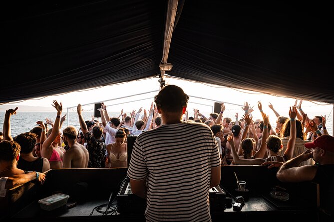 Out to Sea Split Boat Party w/ Blue Lagoon Swim, Dj & Afterparty - Cruising back with the sunset behind you