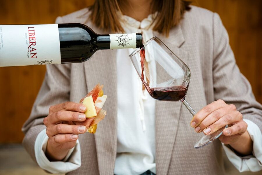Pelješac wine tasting and local winery visit - A generous plate beside the glasses