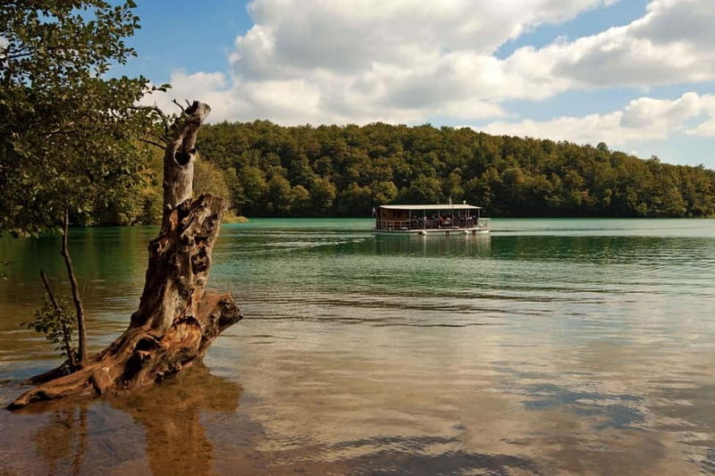 Plitvice Lakes: Guided Walking Tour with Train and Boat Ride - The electric boat ride breaks up the walking
