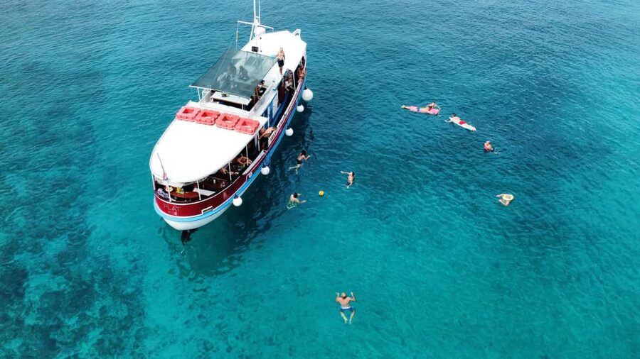Podstrana: Full-Day Boat Trip to Brač and Shipwreck Kontesa - The ride toward Brač begins with small treats