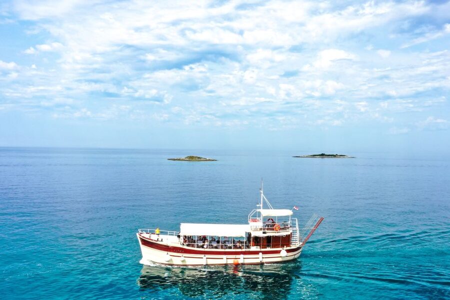 Poreč: Panoramic Morning Cruise Among 20 Islands with Drinks - Twenty islets, changing colors, and open-water views