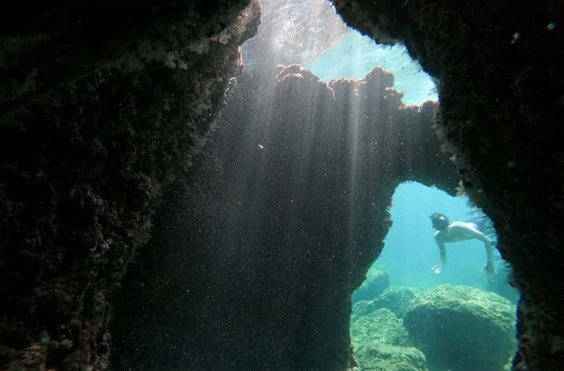 Pula: Cave Kayak, Snorkeling, Cliff Jumping All-in-one Tour - The 50-minute paddle along the rocky coast