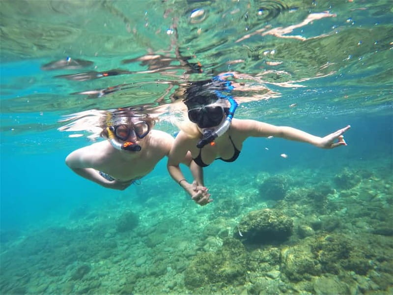 Pula: Cave Kayak Tour, Snorkeling and Island Jumping - Paddling along the coast to the cave