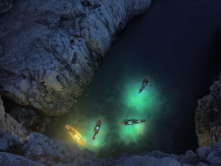 Pula: Cave Sunset/Night Tour in Transparent Kayak - Looking through the illuminated hull