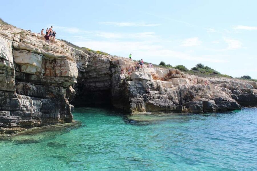 Pula: Kamenjak Bike Tour with Blue Cave and Cliffs Visit - Coastal paths, coves, and open sea views