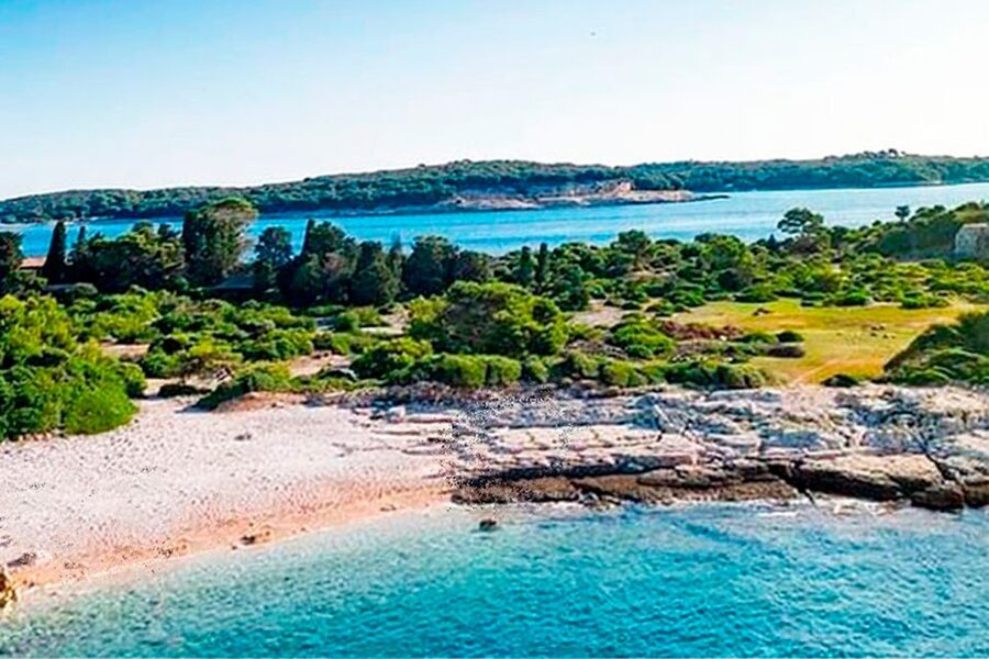 Pula: National Park Brijuni Island Visit & Dolphin Cruise - Returning to Pula with the Roman Arena in view